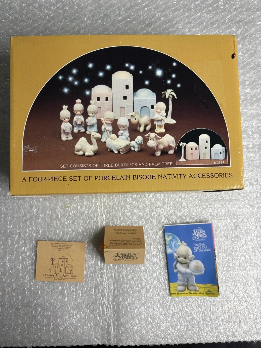 Precious Moments 4-piece set porcelain bisque nativity buildings and a palm tree